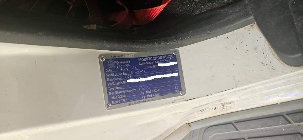 Queensland modification plate fitted with mod code LK1 for a seating capacity change